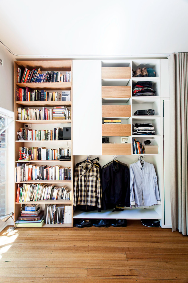 Small contemporary standard wardrobe for men in Melbourne with medium wood cabinets and medium hardwood flooring.