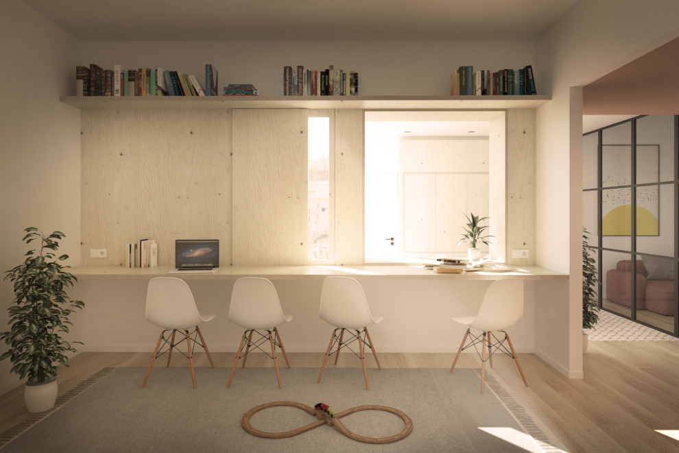 Esempio di un atelier contemporaneo di medie dimensioni con pareti bianche, pavimento in laminato, scrivania autoportante e pareti in legno