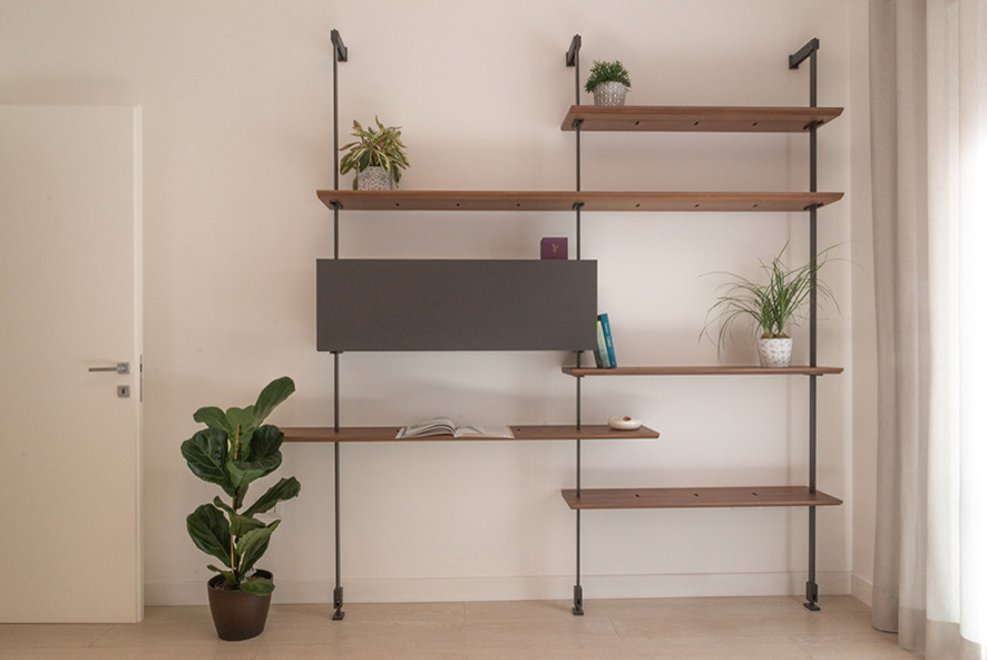 Home studio - mid-sized contemporary freestanding desk laminate floor home studio idea in Rome with beige walls