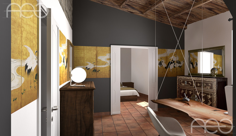 Inredning av ett medelhavsstil mellanstort hemmastudio, med klinkergolv i terrakotta, ett fristående skrivbord och orange golv