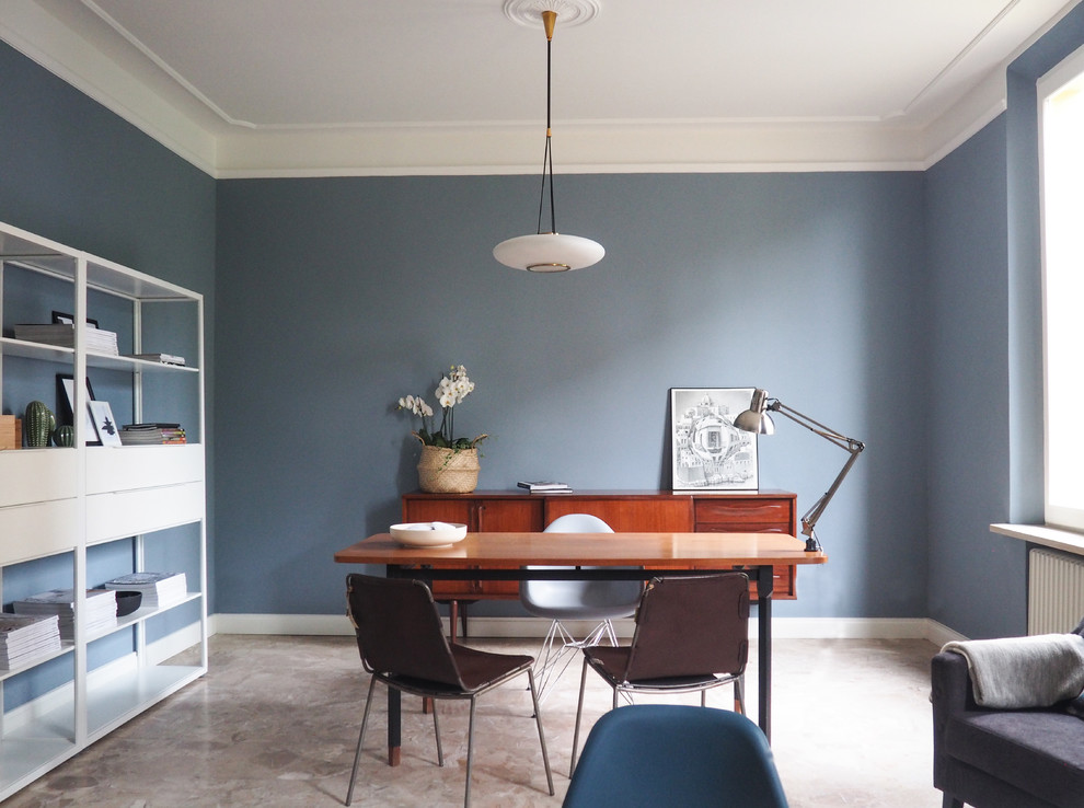 Inspiration for a large scandinavian marble floor and beige floor home office library remodel in Other with blue walls