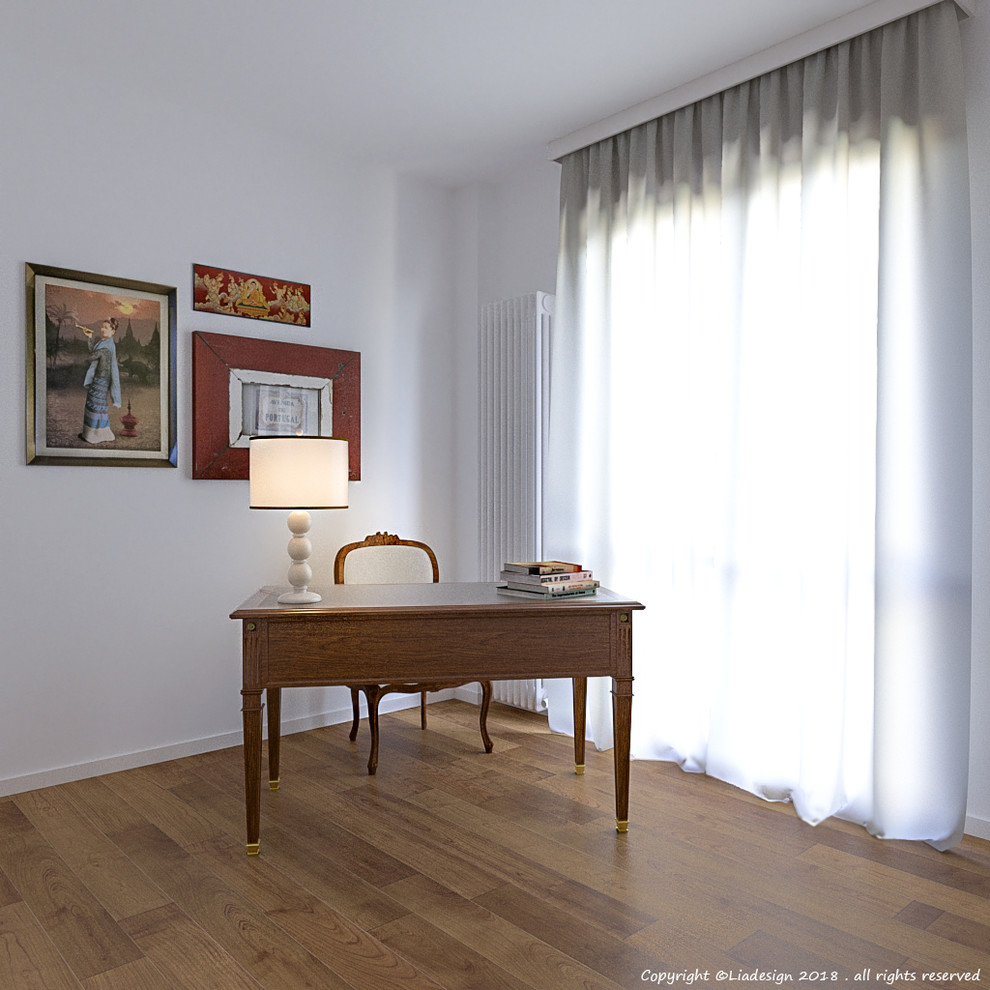 ミラノにあるお手頃価格の中くらいなエクレクティックスタイルのおしゃれなホームオフィス・書斎 (ライブラリー、白い壁、リノリウムの床、自立型机、茶色い床) の写真