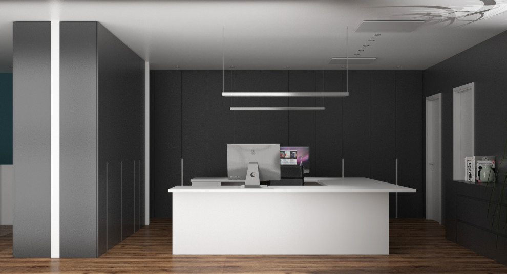 Foto di un ampio ufficio minimalista con pareti grigie, parquet chiaro, scrivania autoportante e pavimento beige