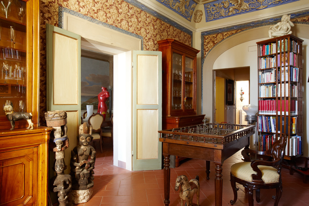 This is an example of an eclectic home office in Florence.