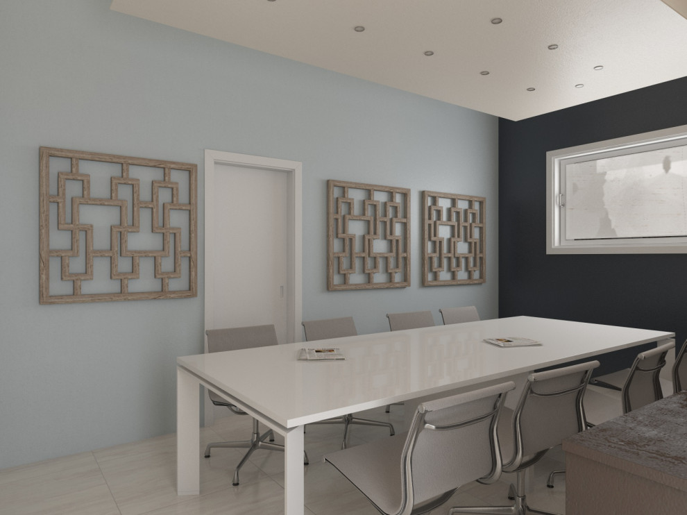 Modernes Arbeitszimmer mit Arbeitsplatz, grauer Wandfarbe, Keramikboden, freistehendem Schreibtisch und beigem Boden in Venedig