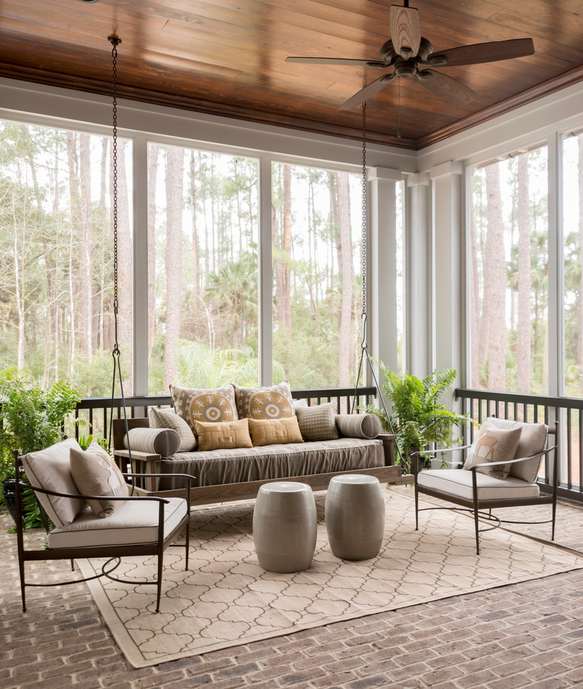 Large transitional brick floor and gray floor sunroom photo in Charleston with a standard ceiling and no fireplace
