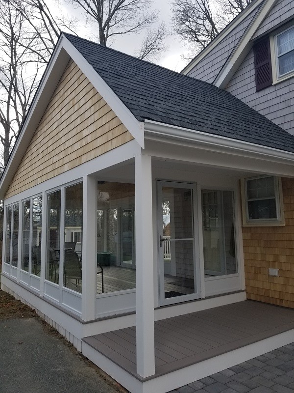 Photo of a medium sized classic conservatory in Providence with a standard ceiling and grey floors.