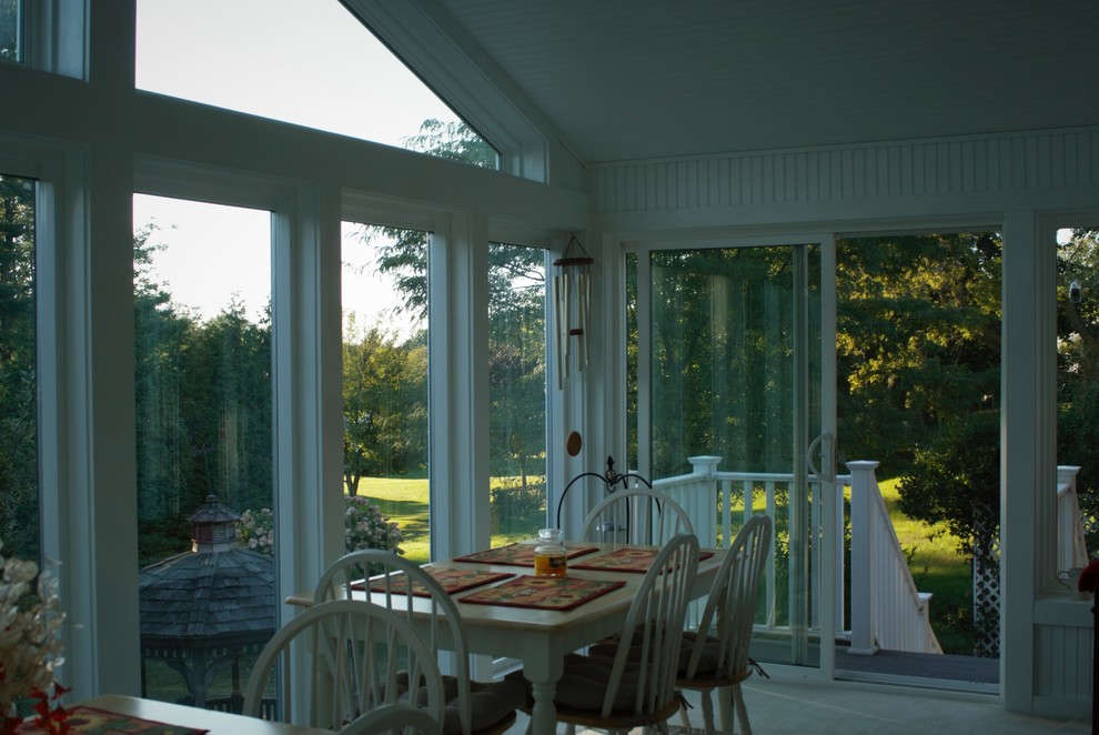 Photo of a medium sized traditional conservatory in Boston with a standard ceiling.