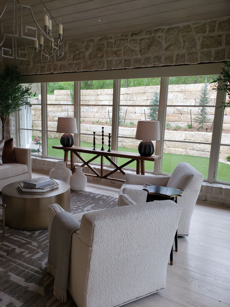 Inspiration for a mid-sized mediterranean laminate floor and gray floor sunroom remodel in Kansas City