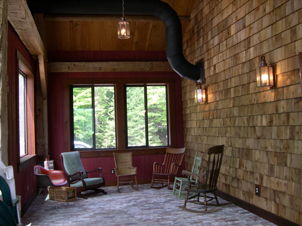 Esempio di una veranda country di medie dimensioni con soffitto classico