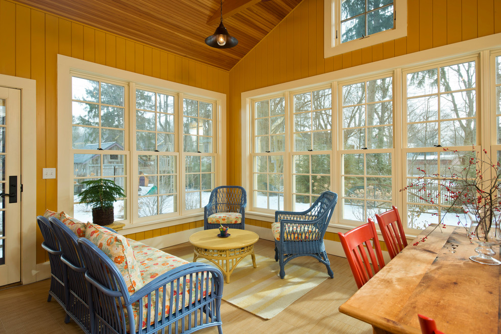This is an example of a rural conservatory in New York with a standard ceiling.