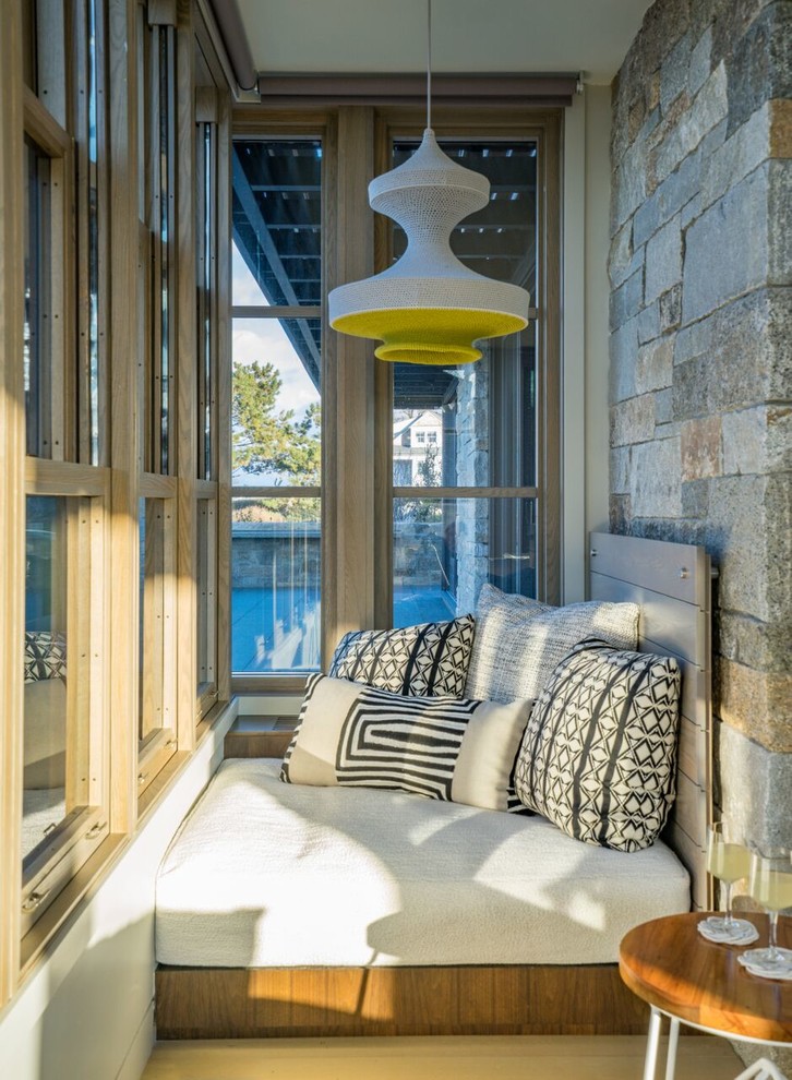 Inspiration for a transitional light wood floor and beige floor sunroom remodel in Boston