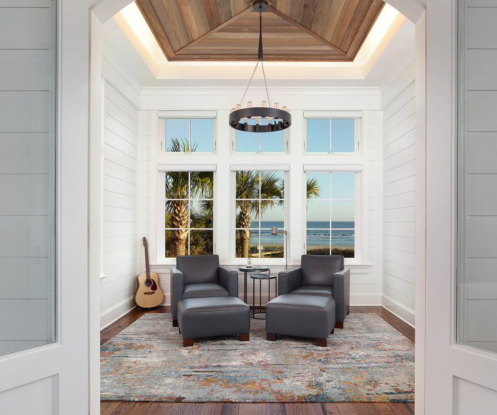 Inspiration for a coastal conservatory in Charleston with dark hardwood flooring, a standard ceiling and brown floors.