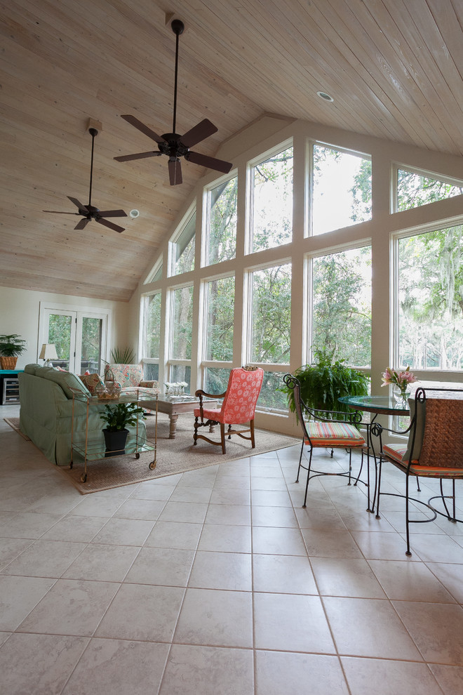 Example of a beach style sunroom design in Charleston