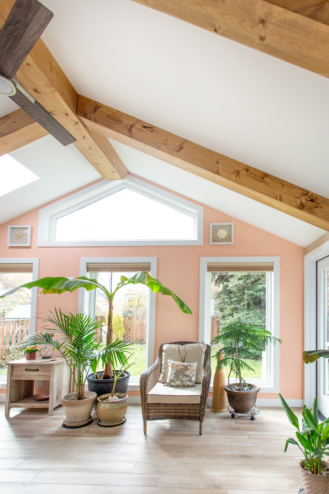 Inspiration for a mid-sized coastal ceramic tile and beige floor sunroom remodel in Edmonton with a skylight