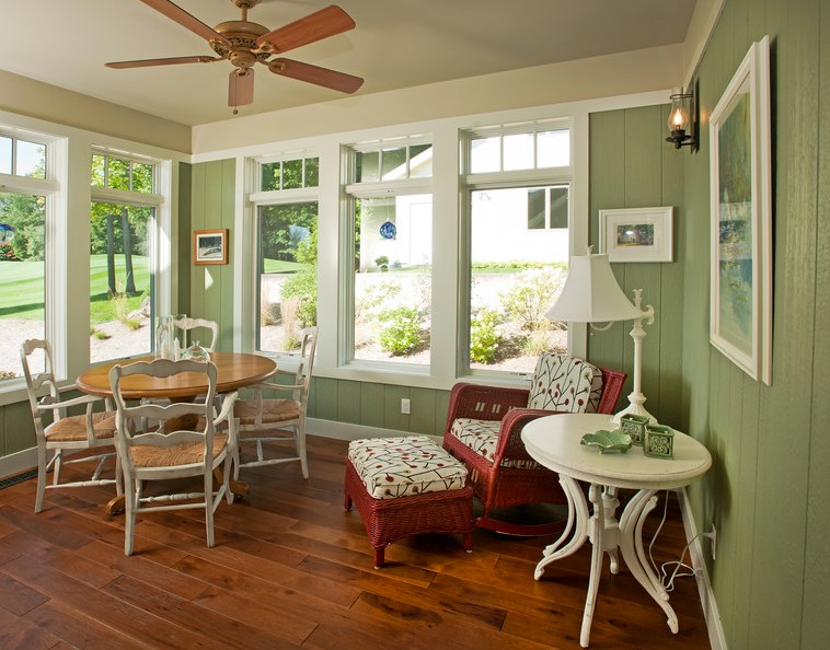 Sunroom - mid-sized craftsman medium tone wood floor and brown floor sunroom idea in Other with no fireplace and a standard ceiling
