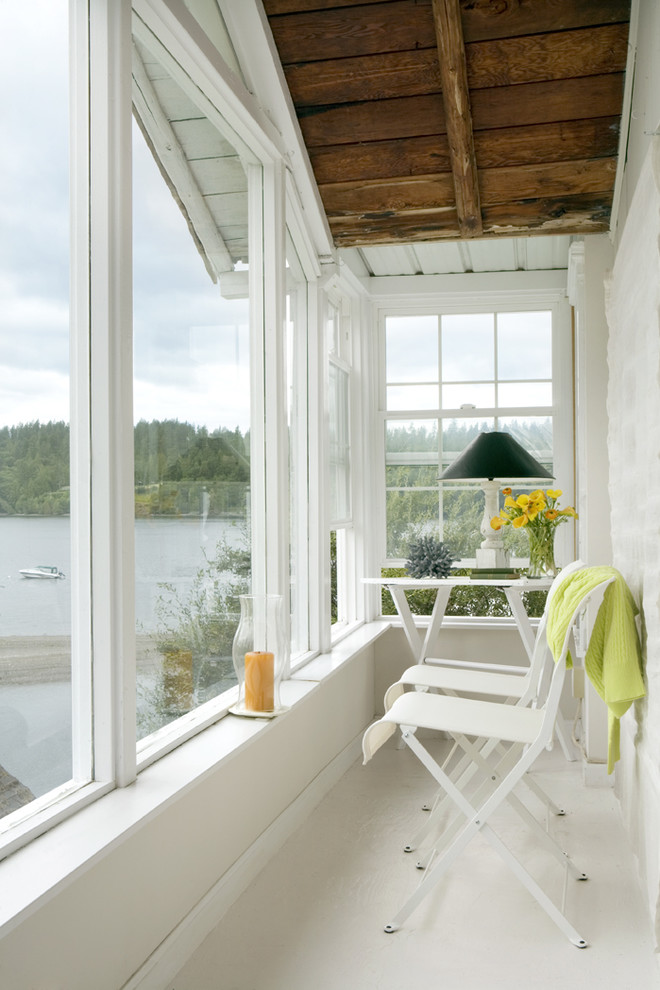 Inspiration for a small timeless sunroom remodel in Portland with a standard ceiling