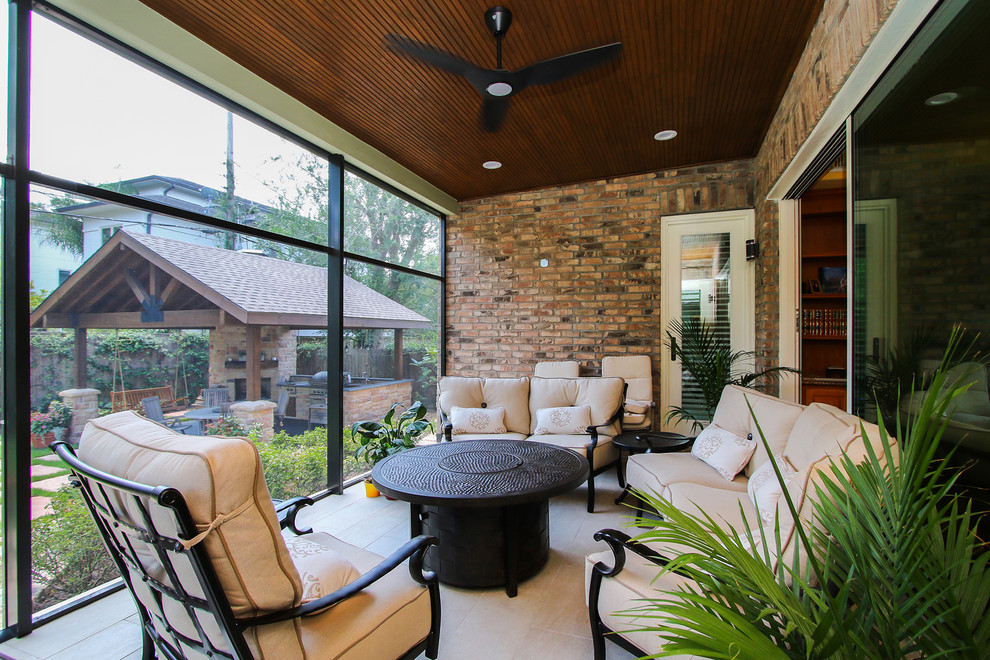 Photo of a large rustic conservatory in Houston with porcelain flooring and beige floors.