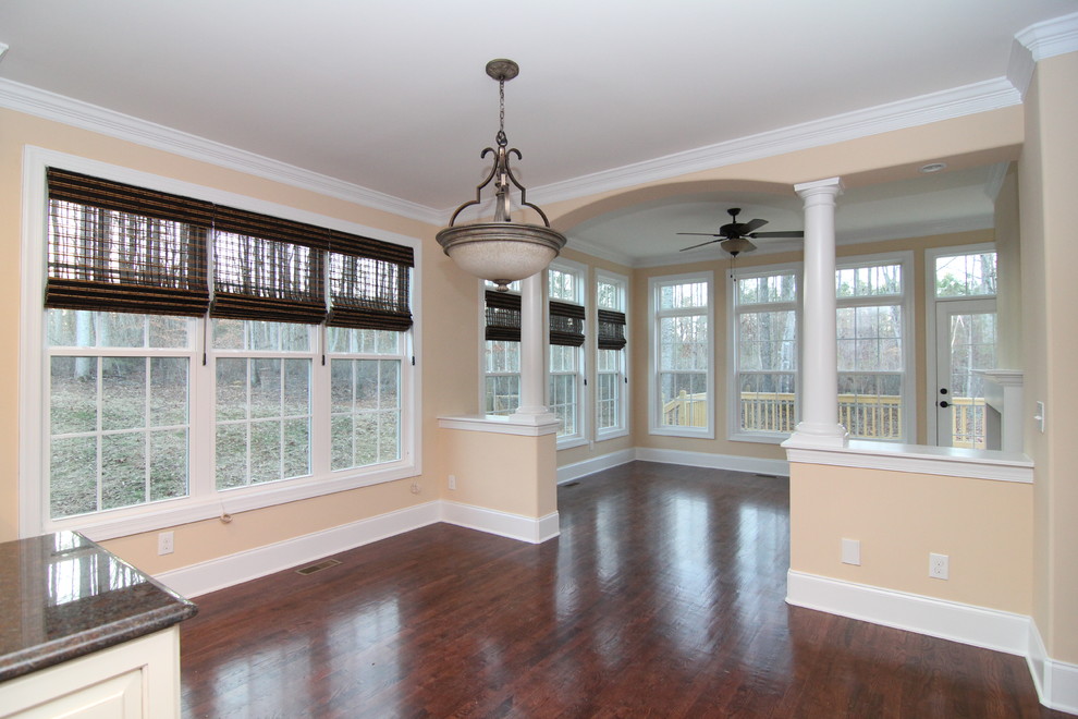 Example of a large classic sunroom design in Raleigh