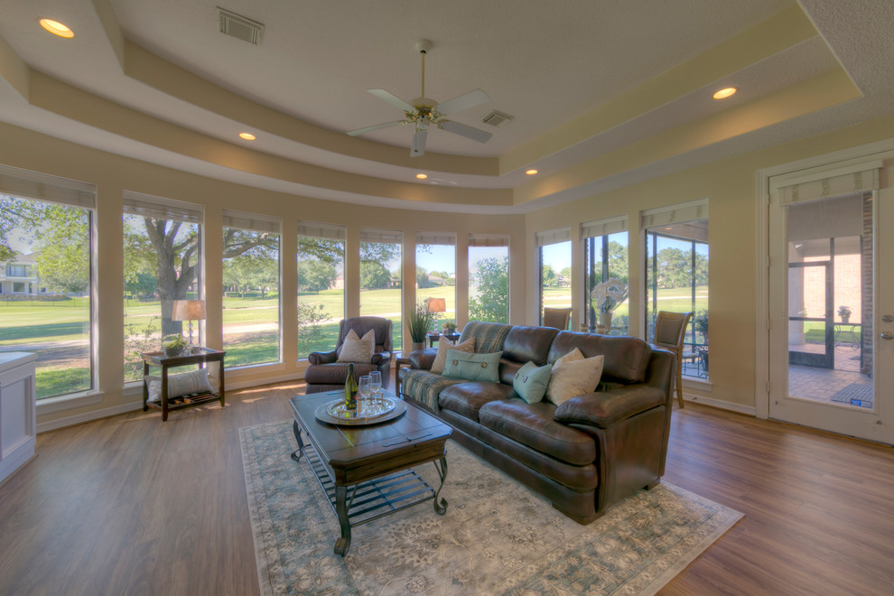 Mid-sized elegant medium tone wood floor and brown floor sunroom photo in Houston with no fireplace and a standard ceiling