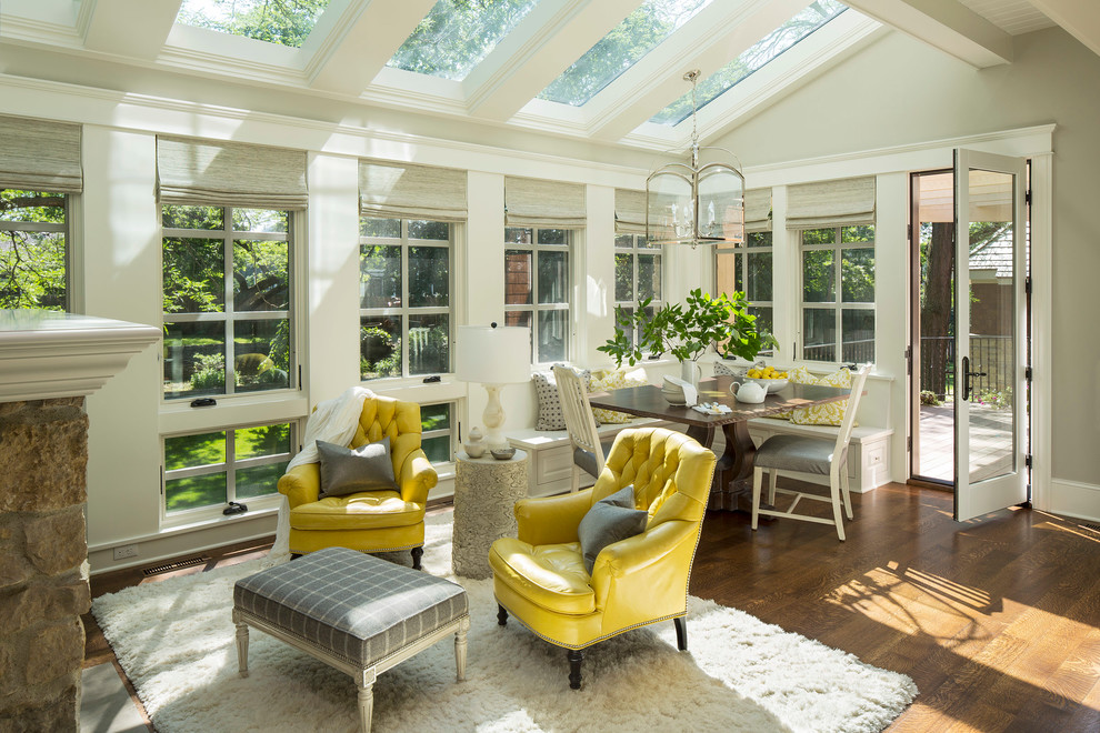 Transitional medium tone wood floor and brown floor sunroom photo in Minneapolis with a glass ceiling