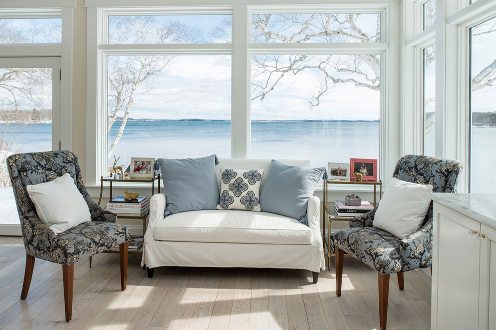 Example of a cottage chic sunroom design in Portland Maine