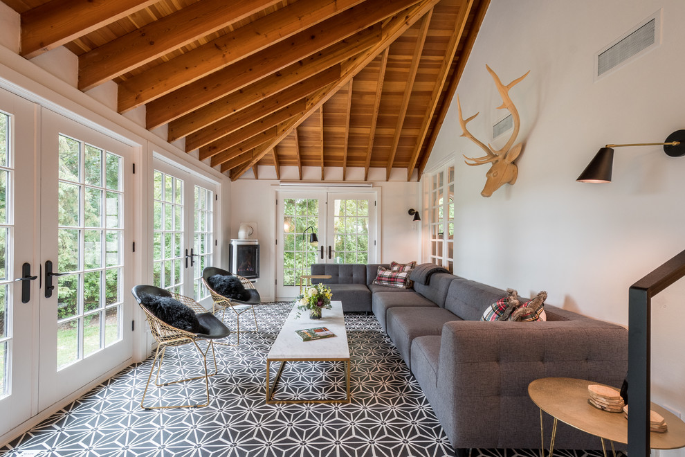 Esempio di una grande veranda moderna con pavimento con piastrelle in ceramica, soffitto classico, pavimento multicolore e camino ad angolo