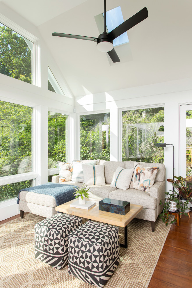 Example of a transitional sunroom design in Raleigh