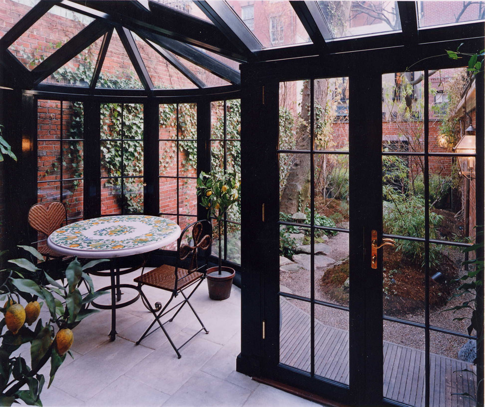 Design ideas for a medium sized traditional conservatory in New York with concrete flooring, no fireplace, a glass ceiling and grey floors.