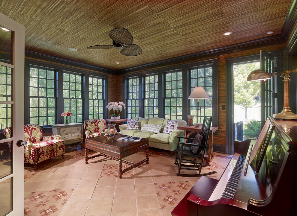 Example of a large classic terra-cotta tile and brown floor sunroom design in Other with a standard ceiling