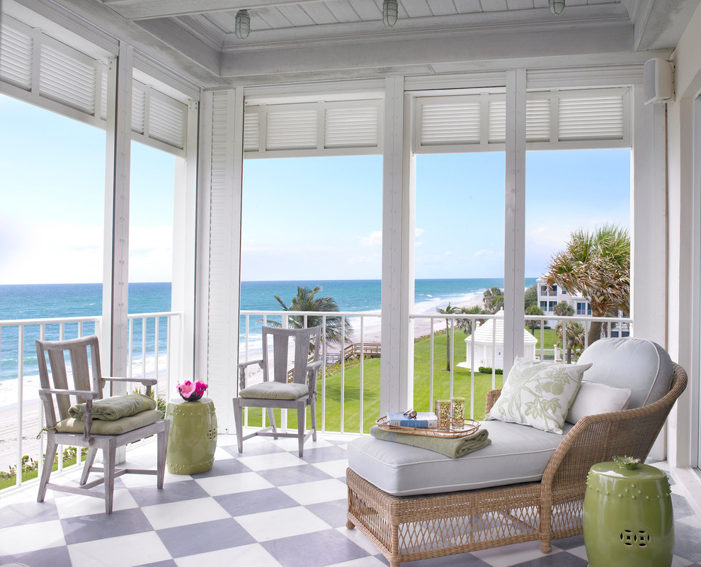 This is an example of a world-inspired conservatory in Miami with a standard ceiling and multi-coloured floors.