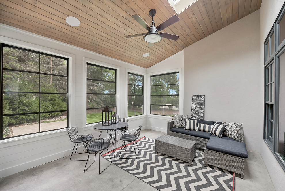 Example of a large transitional concrete floor and blue floor sunroom design in Chicago with no fireplace