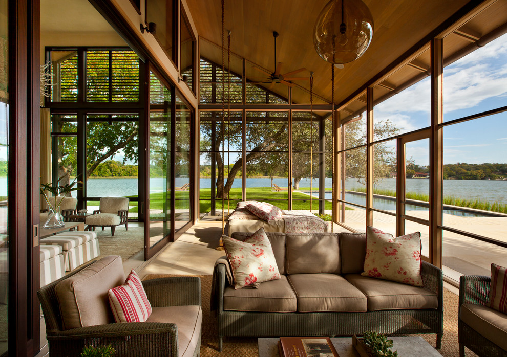 Immagine di una veranda minimal con soffitto classico