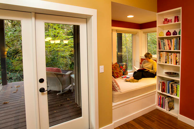 Photo of a contemporary conservatory in Portland with medium hardwood flooring.