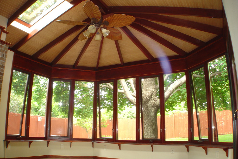 Example of a large arts and crafts sunroom design in Other with a skylight