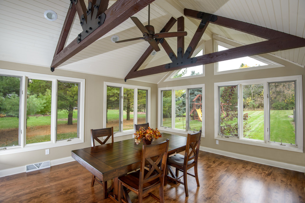 Inspiration for a contemporary conservatory in Milwaukee with medium hardwood flooring.