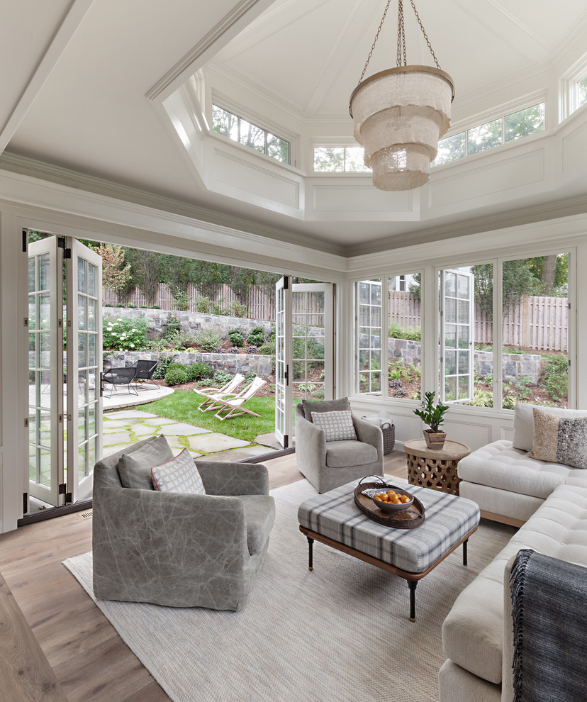 Sunroom - large traditional light wood floor and brown floor sunroom idea in New York with no fireplace and a standard ceiling