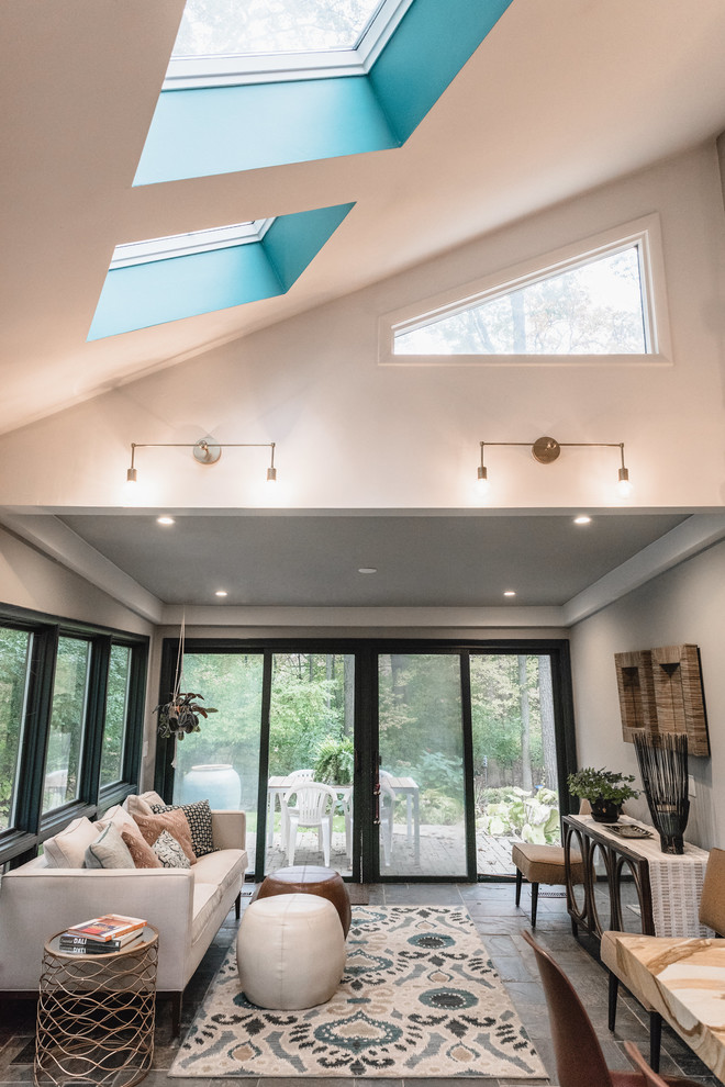 Inspiration for a small 1950s slate floor and multicolored floor sunroom remodel in Detroit with a standard ceiling