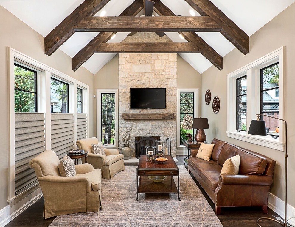 Large elegant dark wood floor and brown floor sunroom photo in Chicago with a standard fireplace, a stone fireplace and a standard ceiling