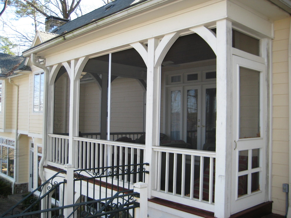 Photo of a medium sized victorian conservatory in Dallas with dark hardwood flooring.