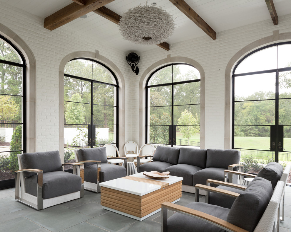 Sunroom - mediterranean gray floor sunroom idea in New Orleans with no fireplace and a standard ceiling