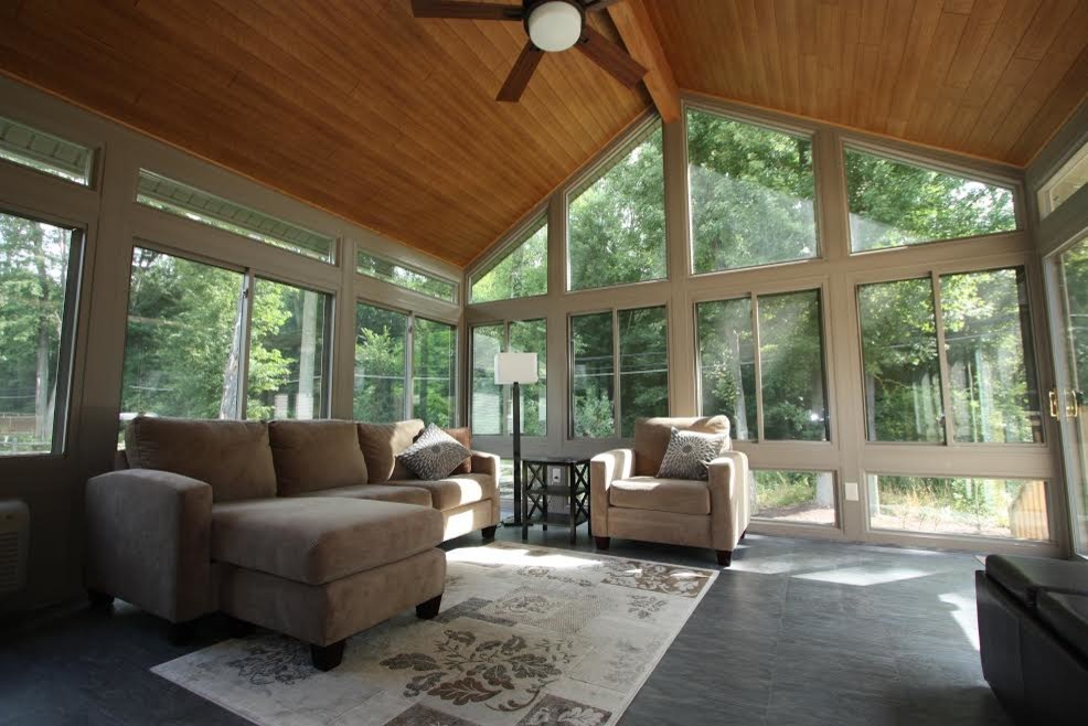 Photo of a large contemporary conservatory in Other with dark hardwood flooring, no fireplace and a standard ceiling.