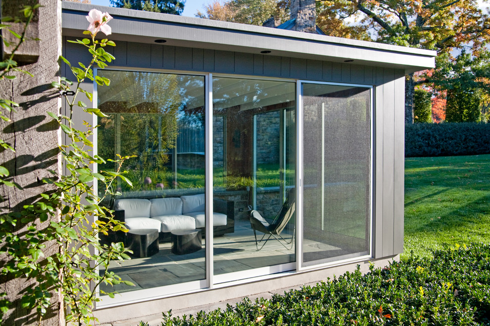 Idee per una veranda contemporanea di medie dimensioni con pavimento in ardesia