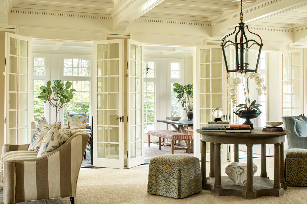 Design ideas for an expansive classic conservatory in New York with carpet and beige floors.