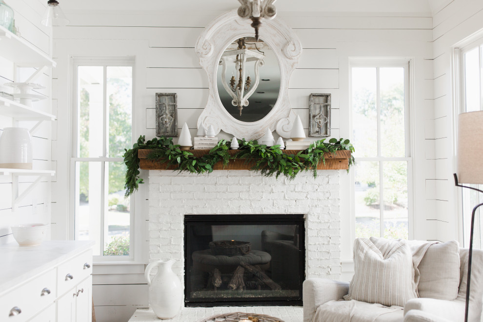 Sunroom - shabby-chic style sunroom idea in Atlanta with a standard fireplace and a brick fireplace