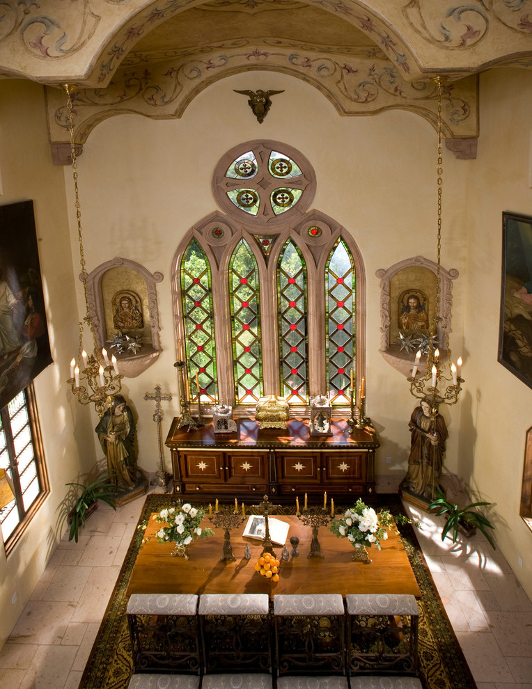 This is an example of a large mediterranean conservatory in San Diego with travertine flooring, no fireplace, a standard ceiling and beige floors.