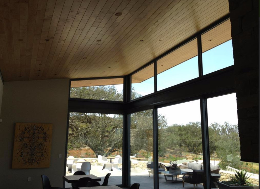 Idee per una veranda moderna di medie dimensioni con soffitto classico