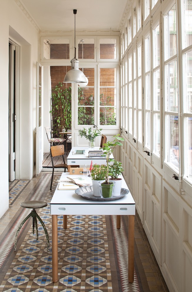 Sunroom - mid-sized transitional ceramic tile sunroom idea in Madrid with no fireplace and a standard ceiling