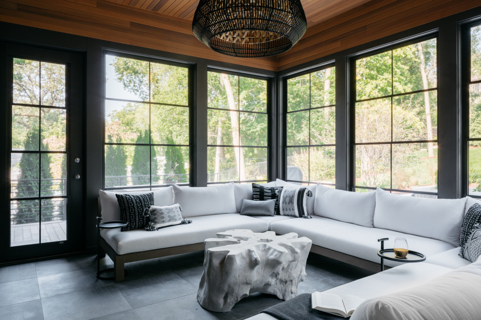 Foto di una veranda minimal con soffitto classico e pavimento grigio