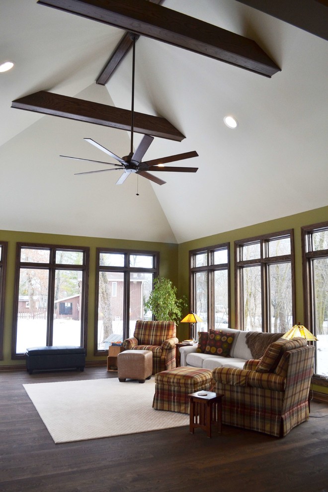 Photo of a medium sized traditional conservatory in Milwaukee with dark hardwood flooring and a standard ceiling.
